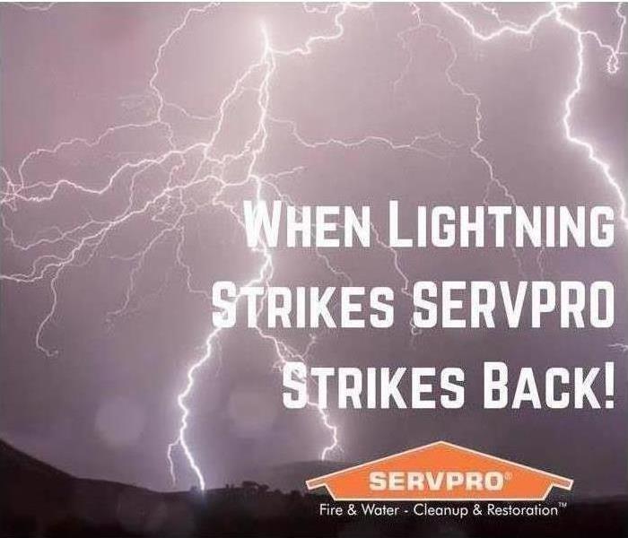 Lightning in background, says When lightning strikes, Servpro strikes back